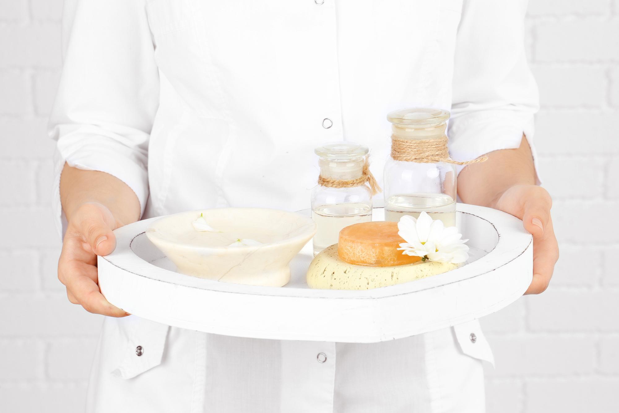 chef arranging a platter by studio window
