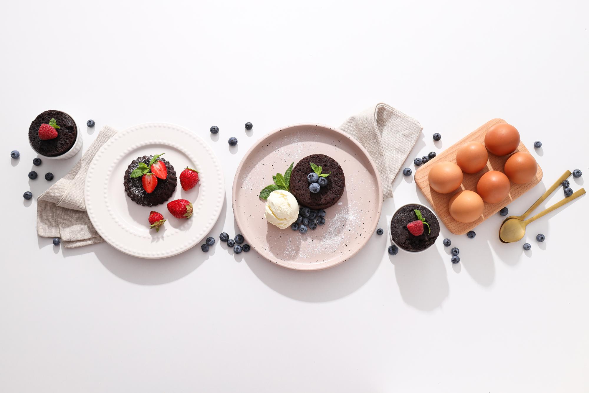 selection of plated tasting courses on neutral table